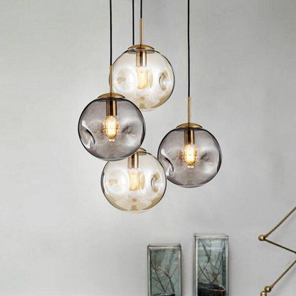 Suspension design à LED boule déformée en verre Head