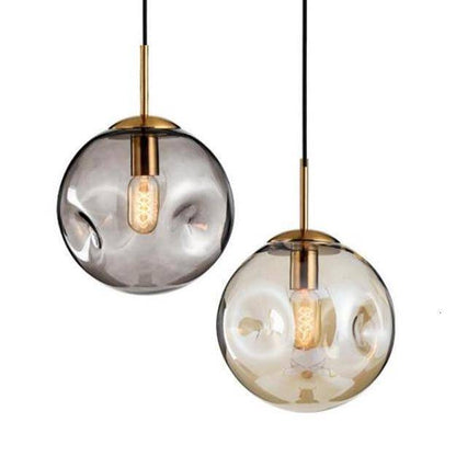 Suspension design à LED boule déformée en verre Head